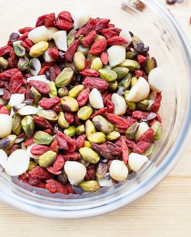 A bowl of pistachio trail mix.