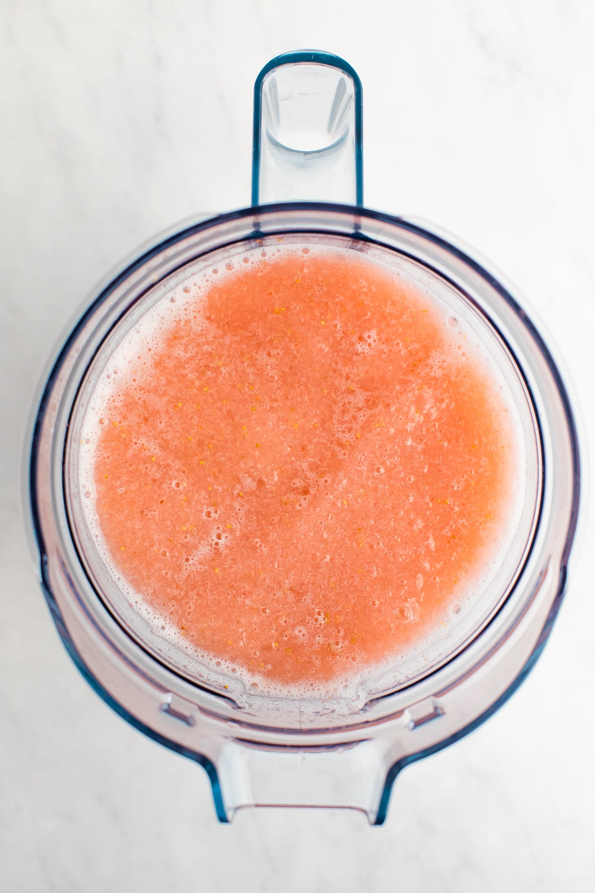 Blender with strawberry frosé.