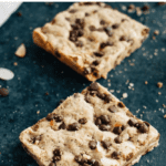 Coffee toffee bars on a table. Cookie bars with chocolate chips and almonds.