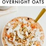 Carrot cake overnight oats topped with coconut and walnuts.