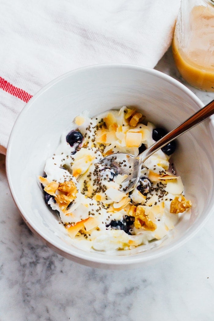 Yogurt Breakfast Bowl with Toasted Coconut, Walnuts, Blueberries and Chia