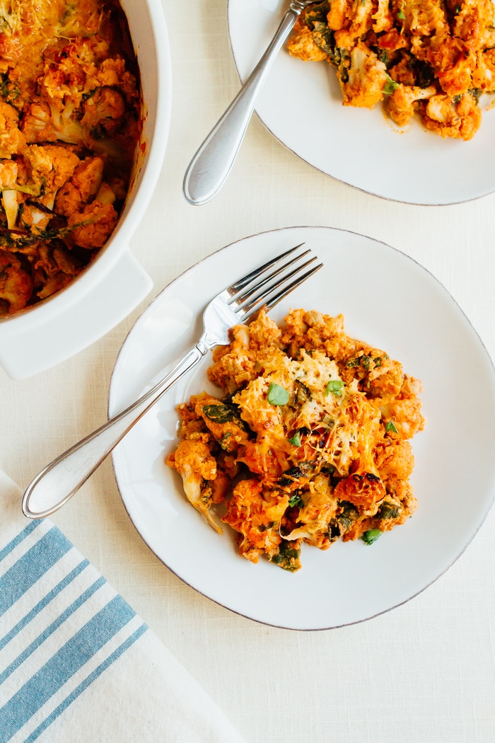 Healthy low carb turkey cauliflower baked ziti on a plate with a fork.