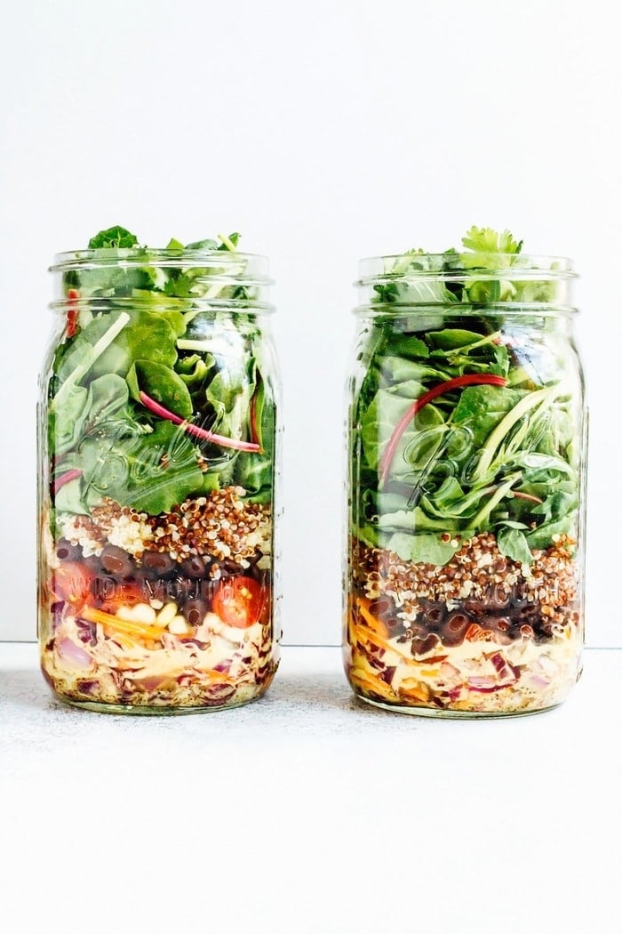 This black bean fiesta mason jar salad makes for a colorful, convenient on-the-go meal. The lime jalapeño dressing is zesty and really ties the whole salad together.