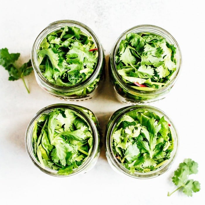 This black bean fiesta mason jar salad makes for a colorful, convenient on-the-go meal. The lime jalapeño dressing is zesty and really ties the whole salad together.