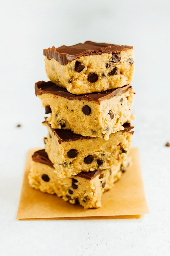 A stack of four no bake healthy cookie dough bars. 