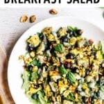 Blueberry Eggs Breakfast Salad with basil and pistachios on a plate.