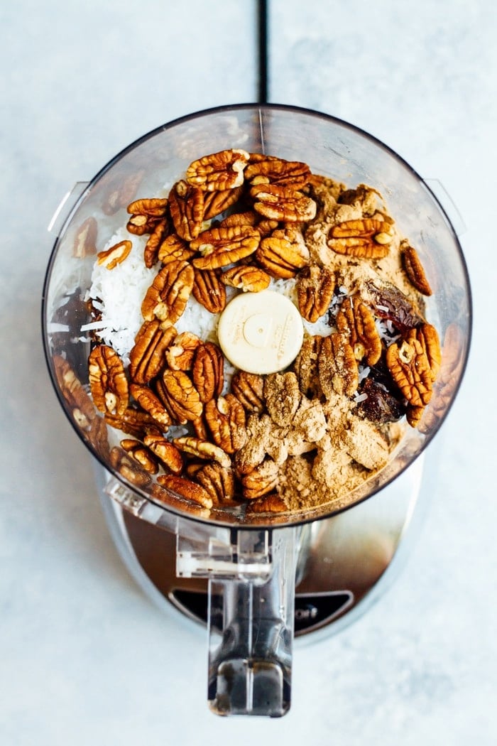 Overhead shot of German Chocolate Energy Bites with Pecans ingredients in food processor.