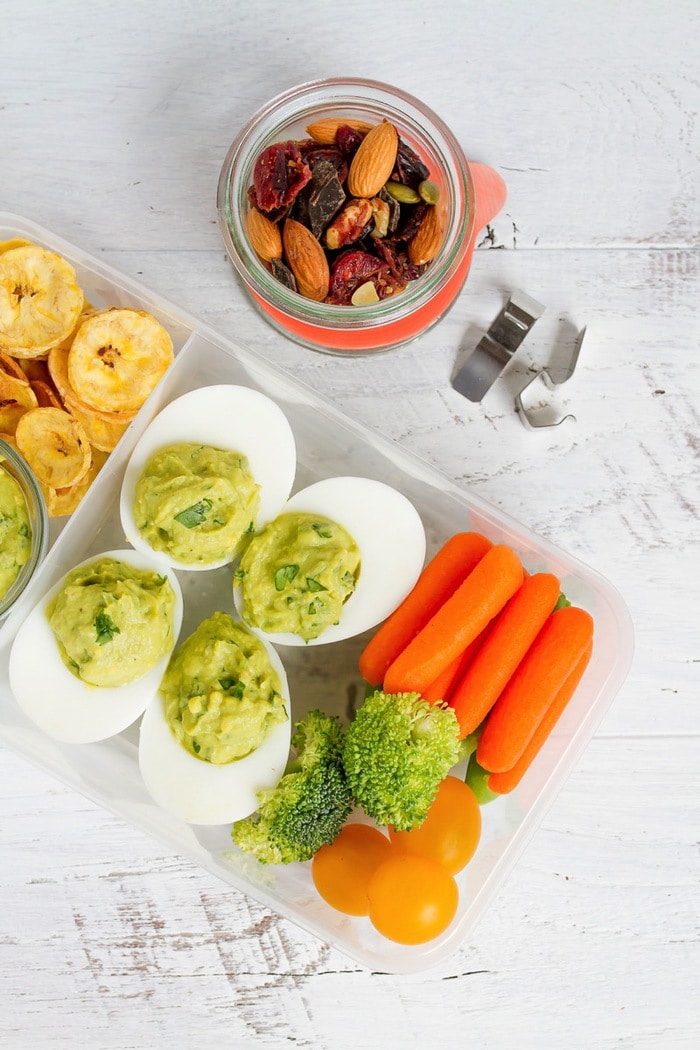 Inspired by the flavor of guacamole, these avocado deviled eggs make for a fun packable lunch idea with plantain chips and veggies! Inspired by the flavor of guacamole, these avocado deviled eggs make for a fun packable lunch idea with plantain chips and veggies!