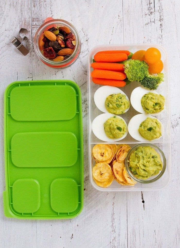 Inspired by the flavor of guacamole, these avocado deviled eggs make for a fun packable lunch idea with plantain chips and veggies! Inspired by the flavor of guacamole, these avocado deviled eggs make for a fun packable lunch idea with plantain chips and veggies!