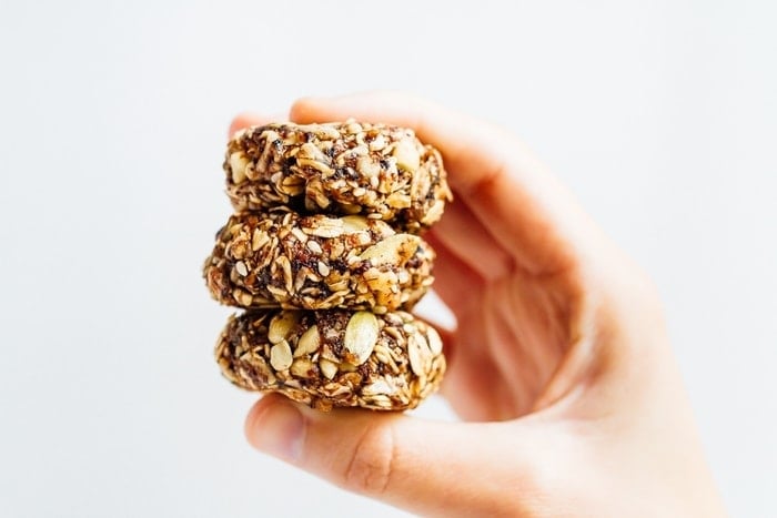 Eat like a bird with these BIRD FOOD ENERGY BITES! Made with whole grain oats, nuts, seeds and dried fruit, these bites are a nutrient-rich treat perfect for on-the-go snacking. Vegan + gluten-free.