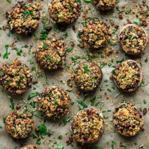 Stuffed mushrooms on parchment.