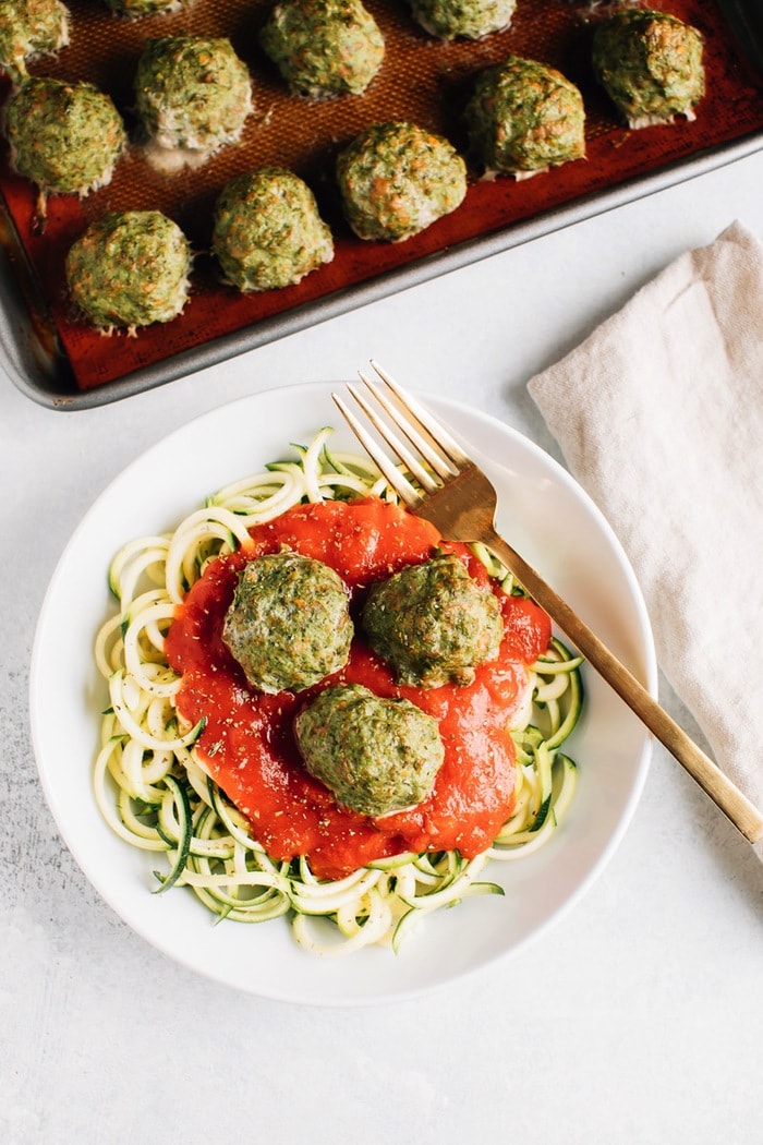 These simple clean eating Popeye turkey meatballs are moist and flavorful, loaded with veggies and require no binders! Great for meal prep because you can add them to pasta, sandwiches, salads and more throughout the week! Gluten-free, dairy-free, paleo. 