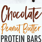 Chocolate Peanut Butter homemade protein RXBARs on a white table with chocolate chips.