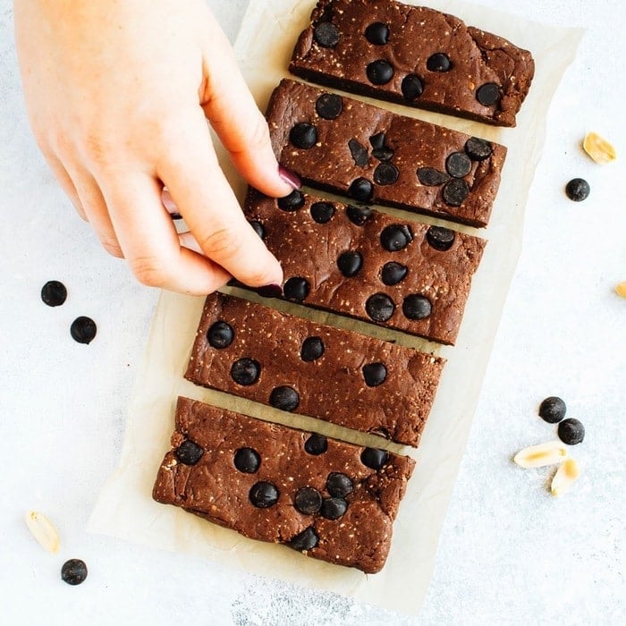Hand Reaching in for the Peanut Butter Chocolate Protein Bars