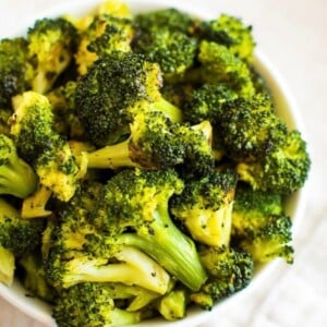 Bowl of roasted broccoli.