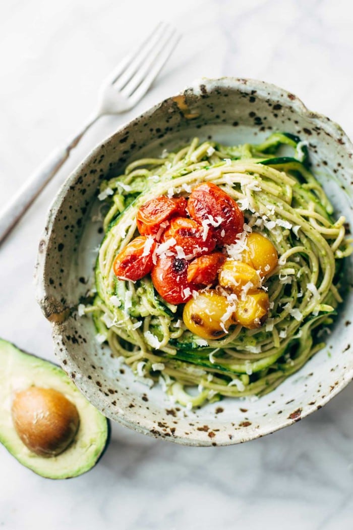 zucchini noodles with tomatoes and avocado sauce