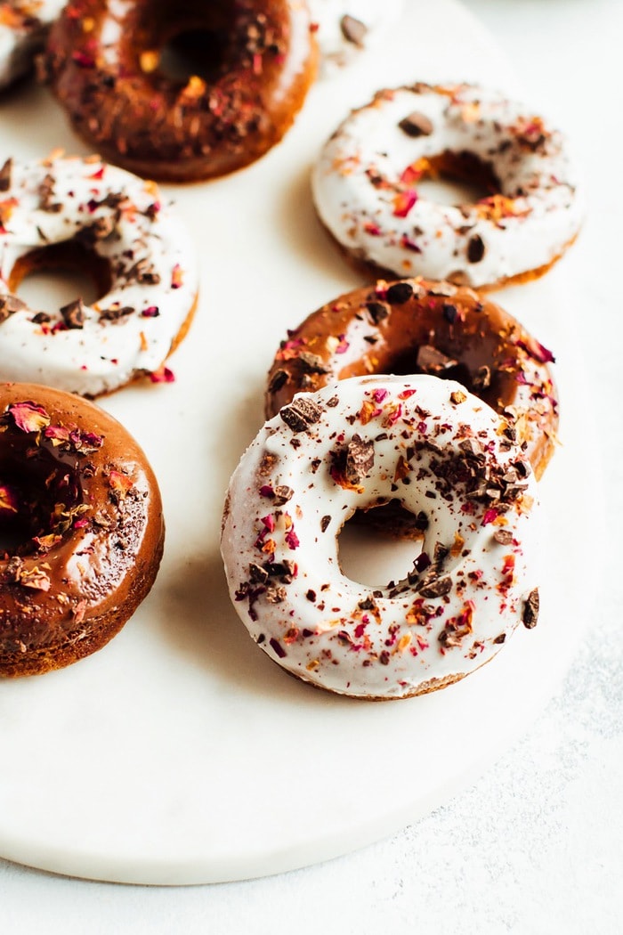 Perfect for Valentine’s Day, these baked almond flour donuts with rose petals and dark chocolate are gluten-free, dairy-free and naturally sweetened with coconut sugar. 