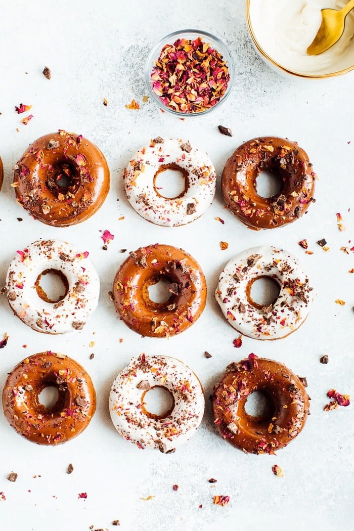 Perfect for Valentine’s Day, these baked almond flour donuts with rose petals and dark chocolate are gluten-free, dairy-free and naturally sweetened with coconut sugar. 
