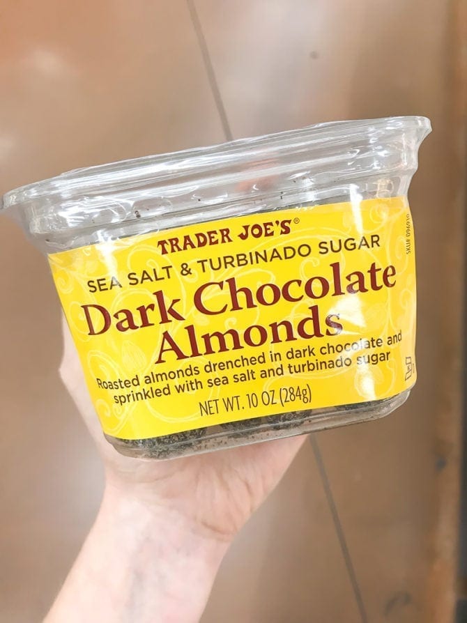 Container of Dark Chocolate Almonds.