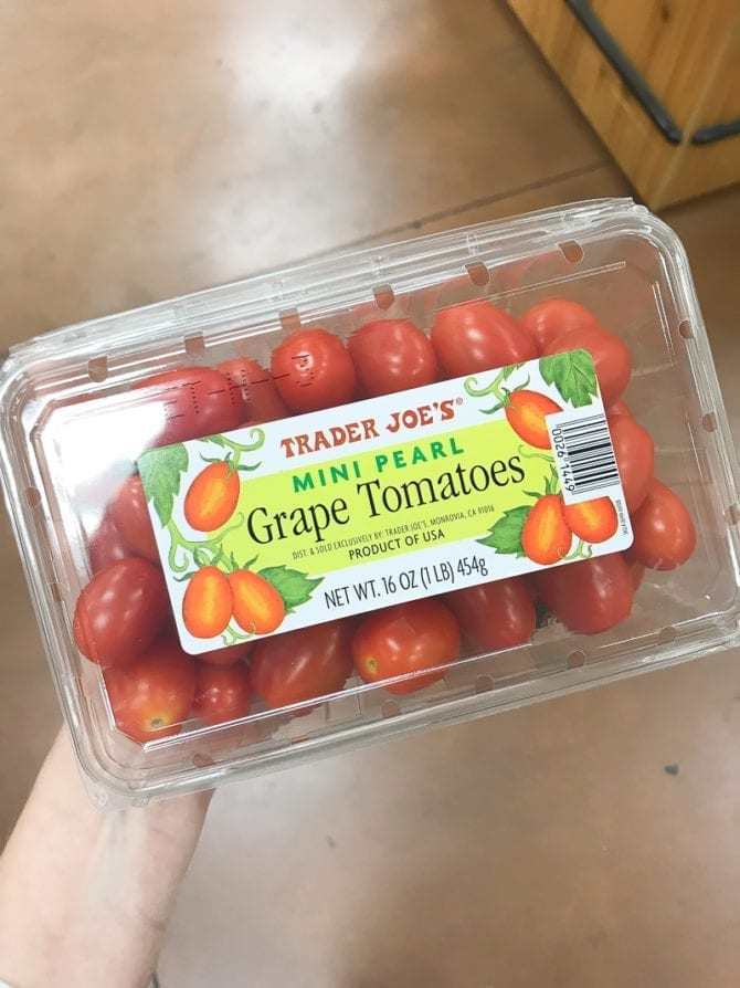 Container of Mini Pearl Grape Tomatoes.