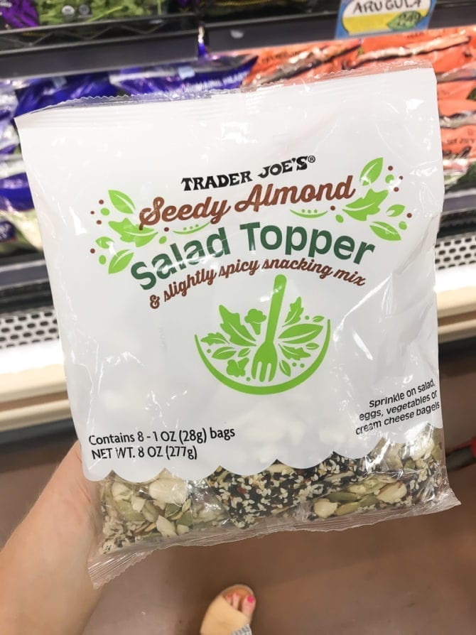 Package of seedy almond salad topper.