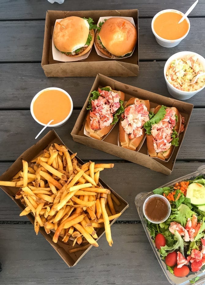 Fox's Lobster House lobster rolls, fries, and a salad.