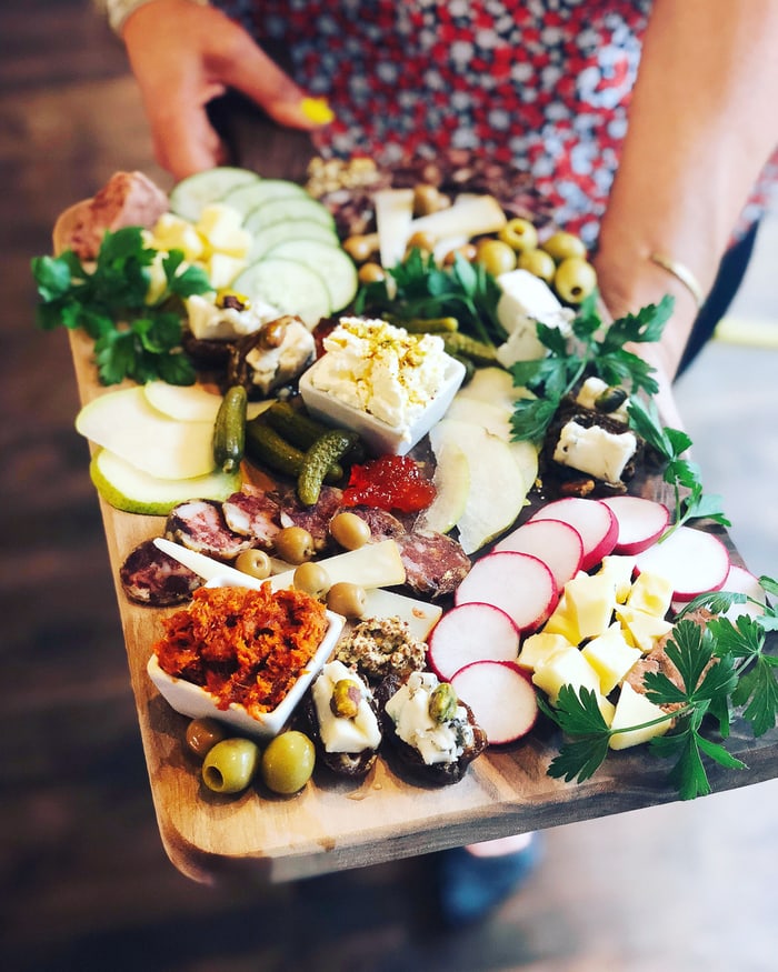 A loaded charcuterie board.