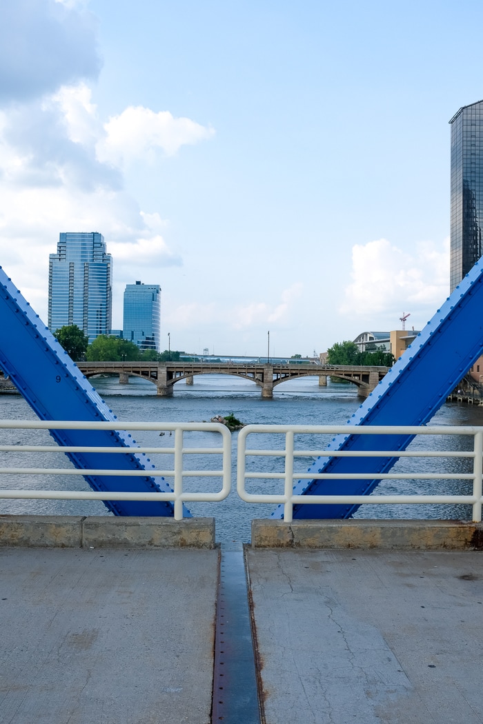 View from a bridge in downtown Grand Rapids, MI of a river and downtown.