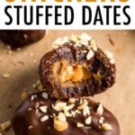 A chocolate covered snickers stuffed date sprinkled with peanuts and a stuffed date with a bite taken out of it so you can see the peanut butter inside.