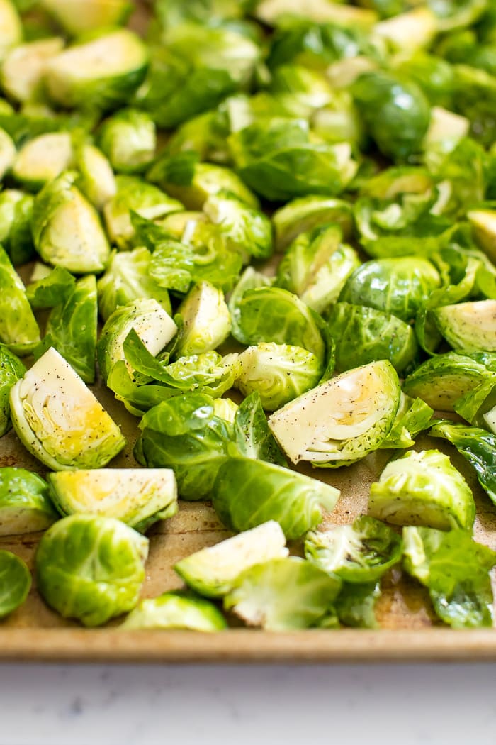 Pan of Brussel sprouts, chopped and tossed with olive oil, salt and pepper.