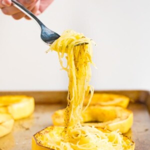 Fork twirling a forkful of roasted spaghetti squash.