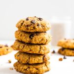 A stack of healthy sweet potato breakfast cookies made with oats, chocolate chips, and pecans.