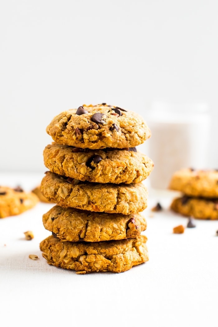 A stack of healthy sweet potato breakfast cookies make with oats, chocolate chips, and pecans.