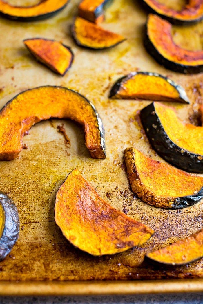 Maple roasted kabocha squash on a baking sheet. 