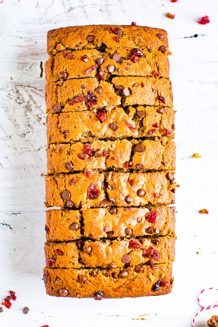 Loaf of sliced cranberry chocolate chip banana bread.