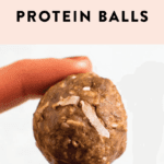 Hand holding an almond joy protein ball.