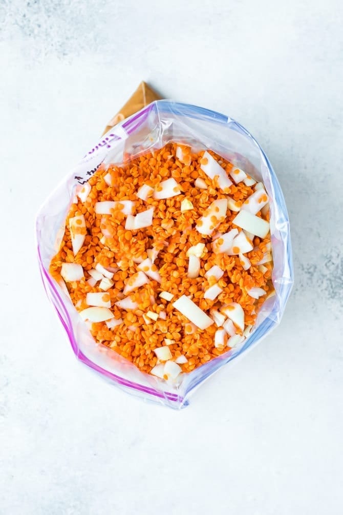 Butternut squash red lentil stew freezer meal ingredients in a freezer bag.