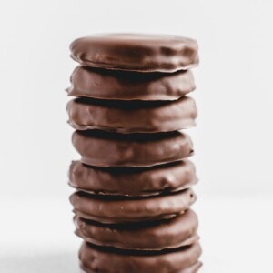 Stack of paleo thin mints on a white background.