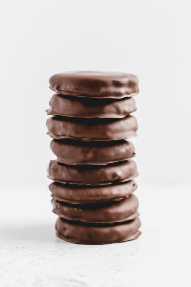 Stack of paleo thin mints on a white background.