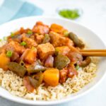 Slow cooker tempeh, onion, pineapple and peppers served over brown rice.