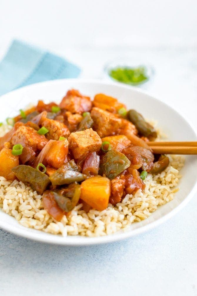 Slow cooker tempeh, onion, pineapple and peppers served over brown rice.