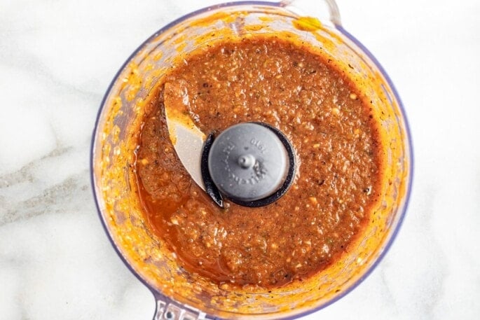 Blended pepper sauce in a food processor.