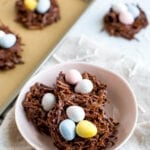 Chocolate coconut flake Easter nest treats with Cadbury eggs in the nest.