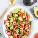 salad with tomatoes, avocado and onion