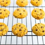Coconut flour chocolate chip cookies on a cooling rack.