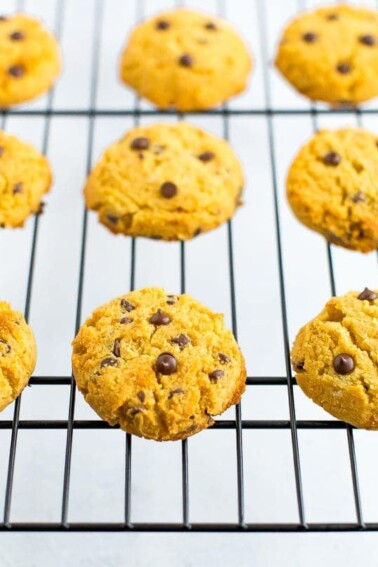 Coconut flour chocolate chip cookies on a cooling rack.