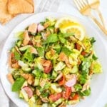 Fattoush salad with lettuce, herbs, vegetables and pita chips/