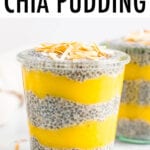 Two jars of chia pudding layered with mango puree and topped with toasted coconut flakes.