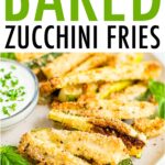 Plate of crispy zucchini fries on a plate with a creamy dip topped with chopped parsley.