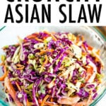 Bowl of asian slaw made with purple cabbage, scallions, peppers and carrots.